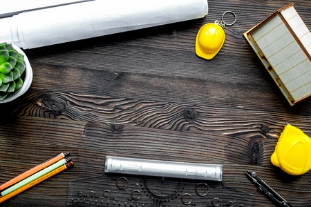 Construction office with architect tools on wooden background top view mock up