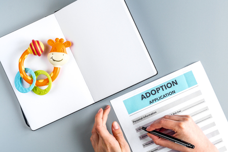 Family concept with notebook on desk top view mock upの写真素材