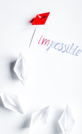 choice concept paper boats on white background top view