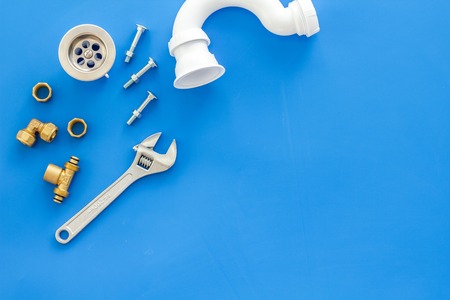 Plumber work with instruments, tools and gear on blue background top view mock upの写真素材