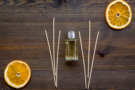 incense sticks with citrus for fresh air on wooden background top viewの写真素材
