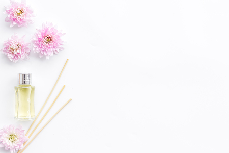 air freshener sticks with flowers on white background top view mockupの写真素材