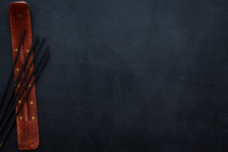 fragrance diffuser for air freshness on dark background top view mock-upの写真素材