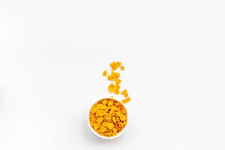 Cereals and flakes from corn and oat on white background top view mockupの写真素材