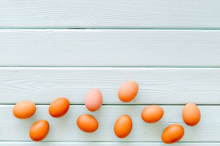 Fresh eggs for organic food on mint green wooden  top view mockupの写真素材
