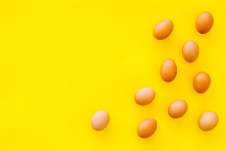 Healthy food. Farm products design for blog with eggs on yellow  top view space for textの写真素材