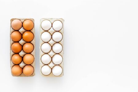 Farm products. Fresh eggs for organic food on white  top view mockupの写真素材