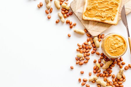 peanut butter for cooking breakfast with sandwiches at home on white background top view mock-up