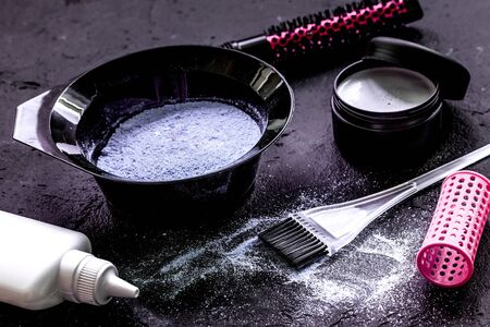 hair dye with brush on dark backgroundの写真素材