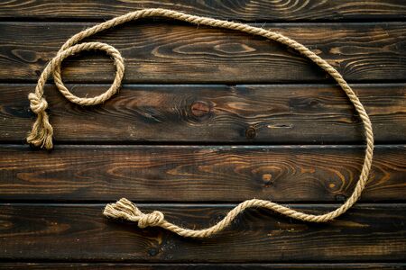 Rope frame on woodenの写真素材