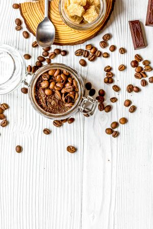 Jar coffee-chocolate scrub top view on wooden tableの写真素材