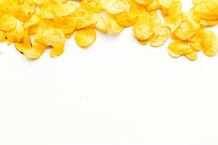 Potato chips pile on white background top view mock upの写真素材