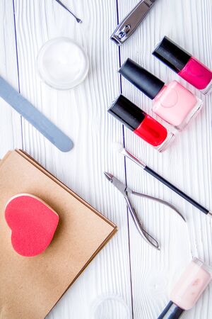 manicure set and nail polish on wooden backgroundの写真素材
