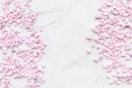 decorative pebble frame for design on marble background top view mockupの写真素材