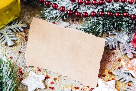 kraft paper and christmas tree decorations close upの写真素材