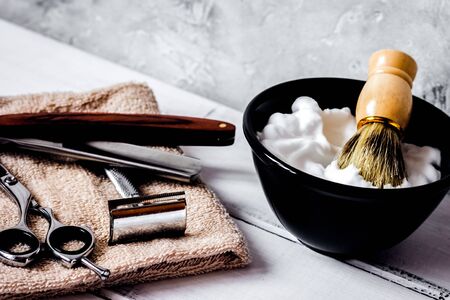 Wooden desktop with tools for shaving beardsの写真素材