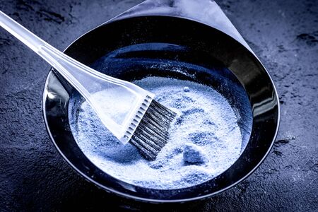 hair dye with brush on dark backgroundの写真素材