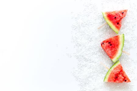 ice lolly from fresh watermelon and ice on white background top view space for textの写真素材