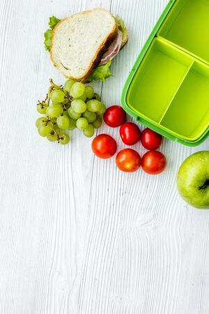 take away with lunchbox and fresh food on white background top view space for textの写真素材