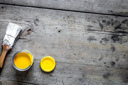 building decoration instruments with with paint, brush in builder work on wooden background top view mock-upの写真素材