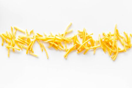 French fries background on white table top-down copy spaceの写真素材