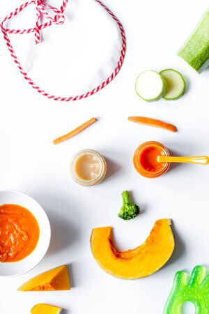 cooking vegetable puree for baby on white background top viewの写真素材