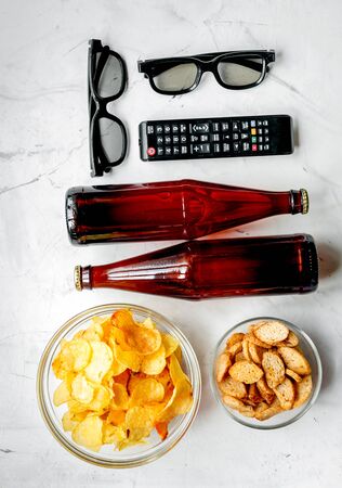 watching movies concept with chips on white background top view mock-upの写真素材