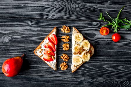 sandwiches set on dark table background top view space for textの写真素材