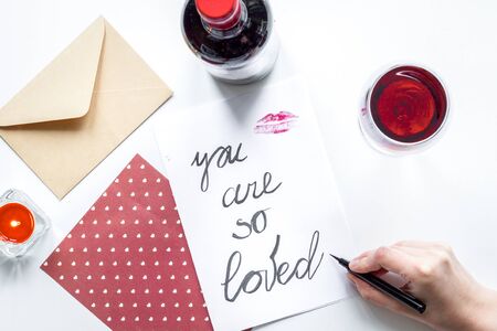concept of Valentine's Day love letter on white background top view.の写真素材