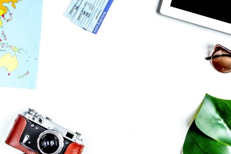 tourist stuff with tablet and map on white background top viewの写真素材