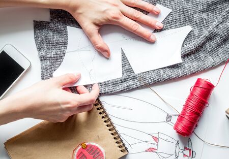 desktop designer clothes with tools top view mock upの写真素材