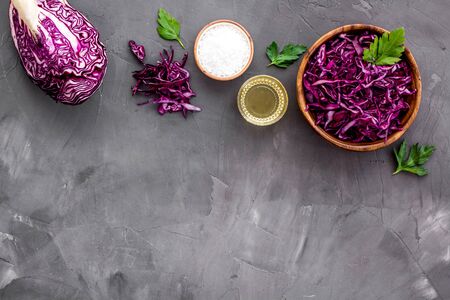 Red cabbage - coleslaw, cold-slaw - on grey kitchen desk top-down copy spaceの写真素材