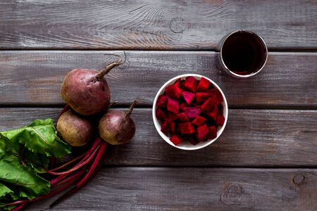 Beet - slices, fresh juice, green tops - from aboveの写真素材