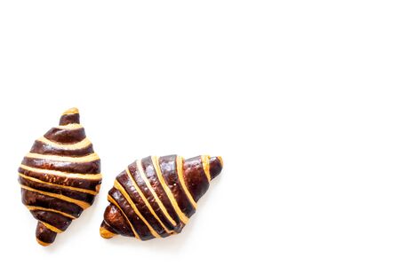 Chocolate croissants on white table top viewの写真素材