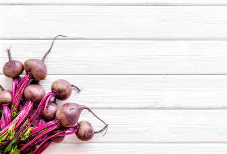Beet - fresh, with leaves - on white table top view copy spaceの写真素材