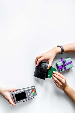 payment by card for gift in shop on white background mock upの写真素材