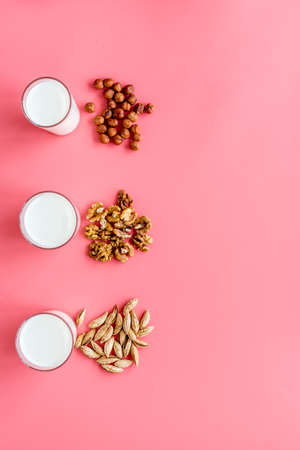 Vegan non-diary milk. Alternative types of milk with nuts and oatの写真素材