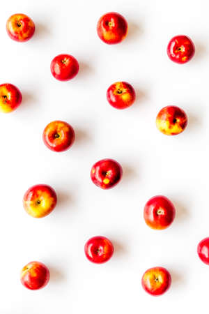 Fruit pattern of red apples on table desk top view