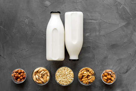 Vegan non-diary milk. Alternative types of milk with nuts and oat