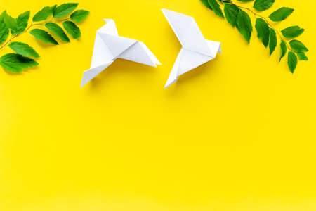 Origami pigeon. World Peace Day, care concept. Top viewの写真素材