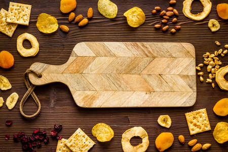 Fast food snacks collection - nuts and dried fruits top viewの写真素材