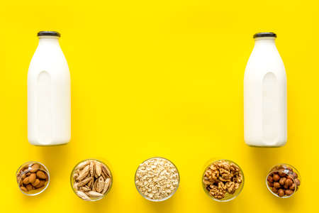 Set of non-dairy milk - almond hazelnut walnut oat. Top view, copy spaceの写真素材
