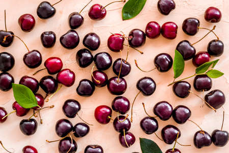 Ripe juicy cherries berries background. Overhead view, flat layの写真素材