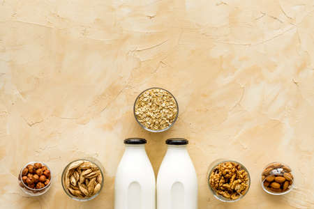 Vegan non-diary milk. Alternative types of milk with nuts and oatの写真素材