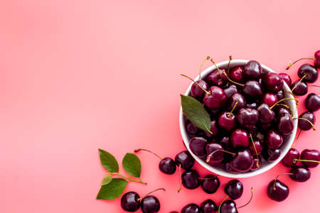 Frame of red cherries, berries background. Overhead viewの写真素材