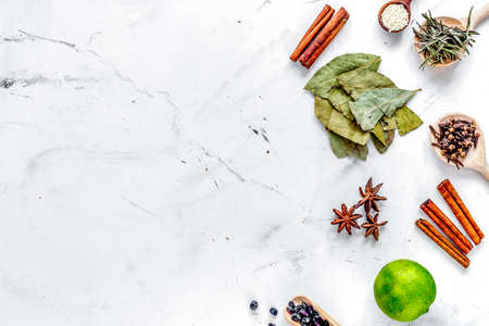 Cooking with spices, vanilla, cinnamon on kitchen table background top view mock-upの写真素材