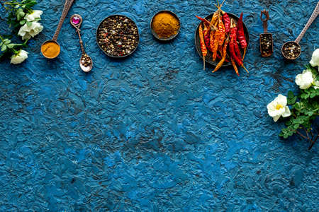 Overhead view of hot spice. Red pepper and paprika with cooking utensilsの写真素材