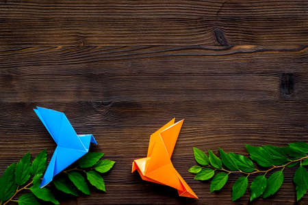 Origami birds are flying, overhead top view