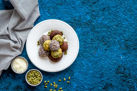 Top view of raw vegan energy balls with nuts and cacaoの写真素材