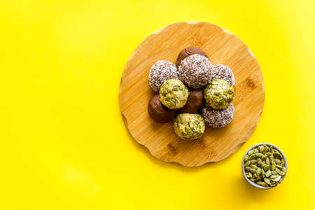 Energy protein balls with ingredients, top view